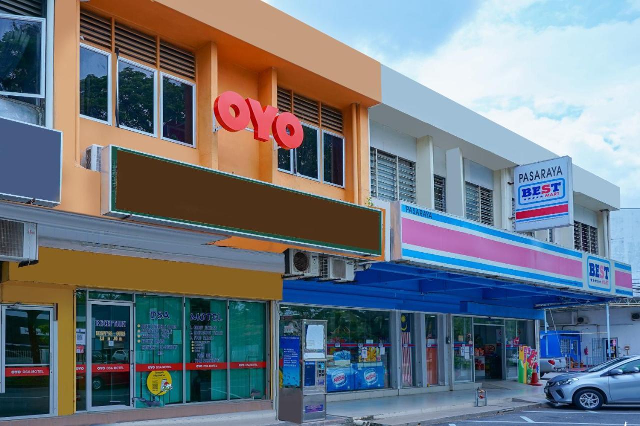 Oyo 89850 Mutiara Motel Kuah Buitenkant foto